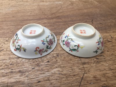 Lot 175 - TWO CHINESE YELLOW-GROUND 'CHARACTERS' SAUCERS.