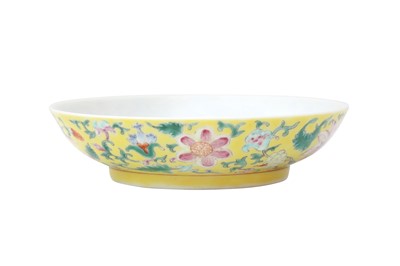Lot 273 - A CHINESE FAMILLE ROSE YELLOW-GROUND 'BLOSSOMS' DISH.