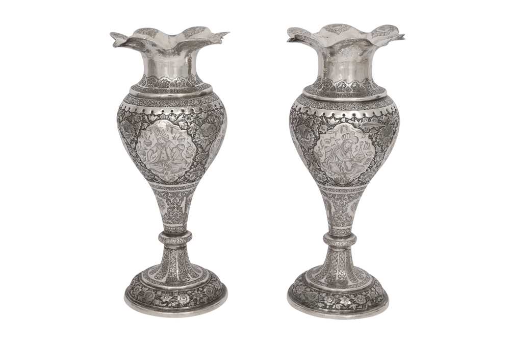 Lot 614 - A PAIR OF IRANIAN SILVER POSY VASES