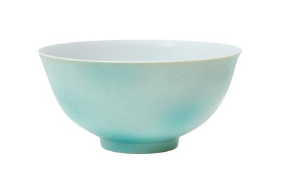 Lot 252 - A CHINESE TURQUOISE-ENAMELLED INCISED 'DRAGON' BOWL.