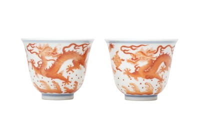 Lot 341 - A PAIR OF CHINESE IRON-RED 'DRAGON' CUPS.