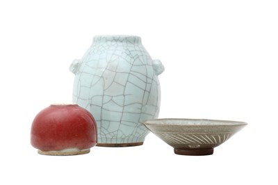 Lot 317 - A CHINESE COPPER RED-GLAZED WASHER, A CRACKLE-GLAZED VASE AND A SLIP-DECORATED BOWL.