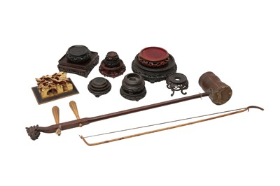 Lot 550 - A COLLECTION OF CHINESE WOOD STANDS, A WOOD PANEL AND AN ERHU.