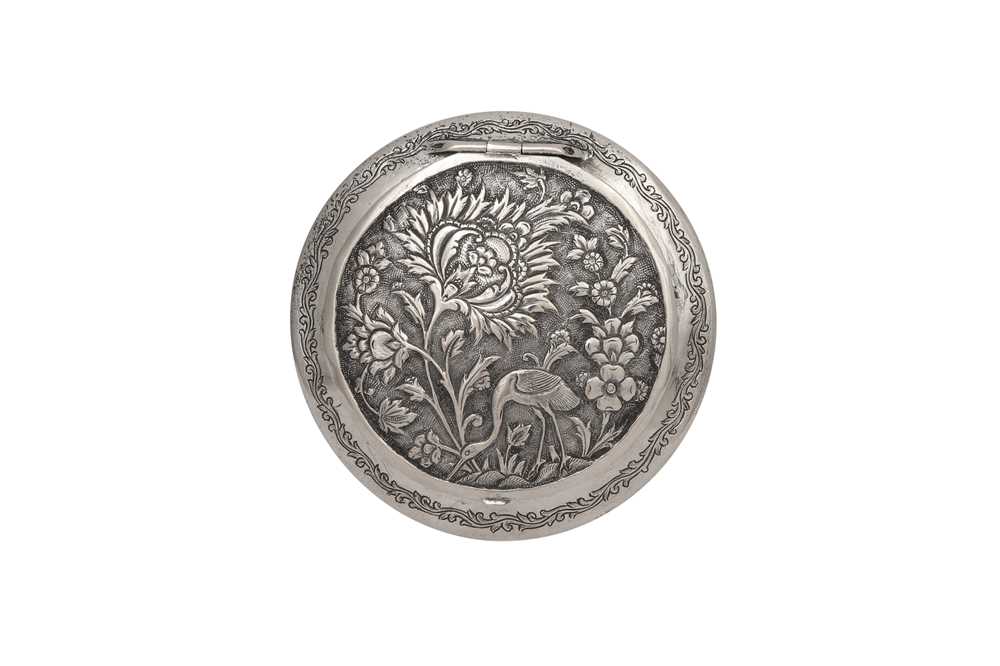 Lot 596 - AN IRANIAN ENGRAVED SILVER COMPACT WITH MIRROR