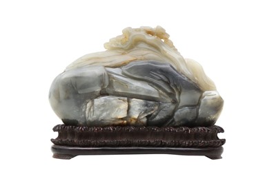 Lot 83 - A CHINESE PALE CELADON AND GREY JADE 'MOUNTAIN' CARVING.