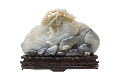Lot 83 - A CHINESE PALE CELADON AND GREY JADE 'MOUNTAIN' CARVING.