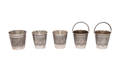 Lot 621 - FIVE IRANIAN ENGRAVED SILVER BEAKERS