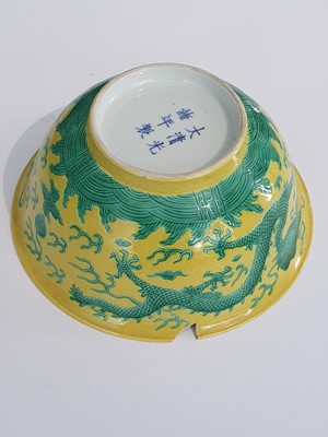 Lot 277 - A CHINESE YELLOW-GROUND 'DRAGON' BOWL.