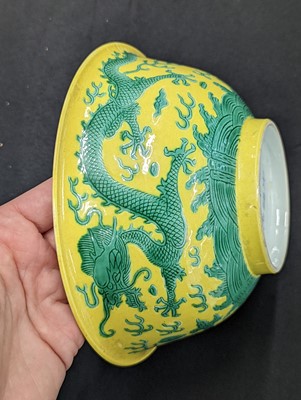 Lot 277 - A CHINESE YELLOW-GROUND 'DRAGON' BOWL.