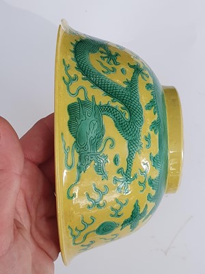 Lot 277 - A CHINESE YELLOW-GROUND 'DRAGON' BOWL.