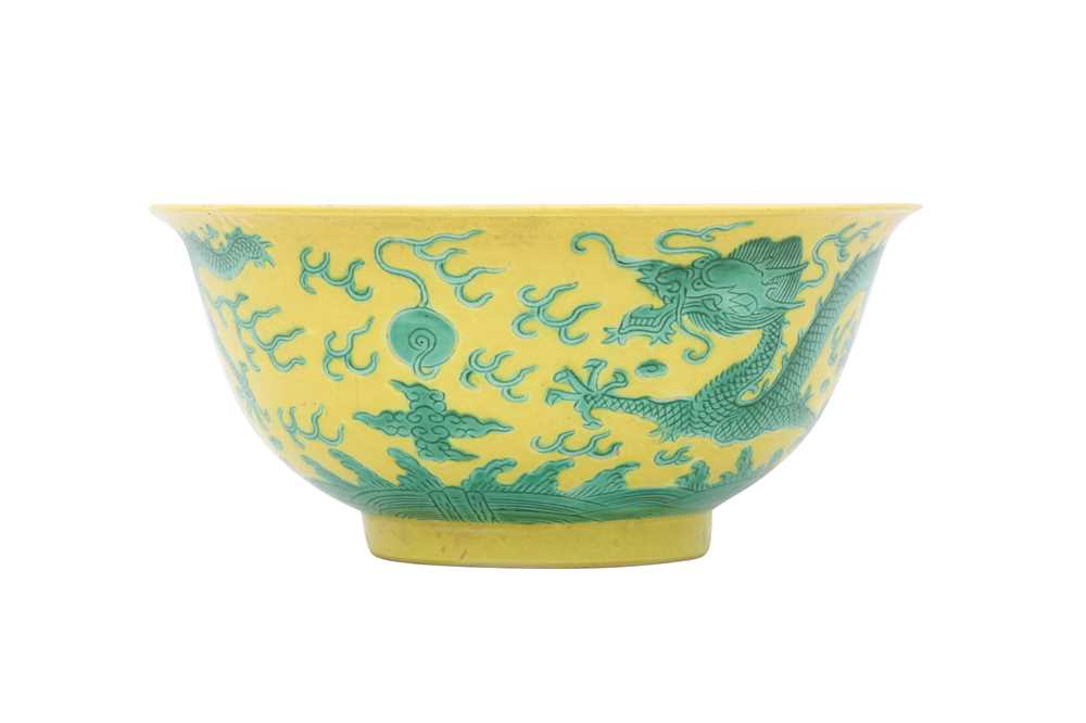 Lot 277 - A CHINESE YELLOW-GROUND 'DRAGON' BOWL.