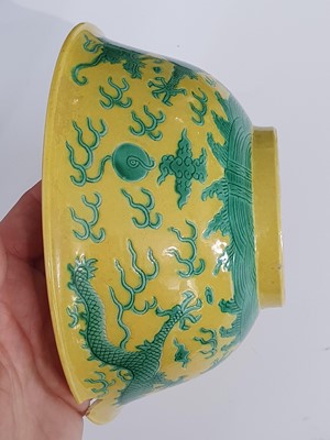 Lot 277 - A CHINESE YELLOW-GROUND 'DRAGON' BOWL.