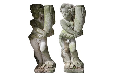 Lot 238 - A PAIR OF RECONSTITUTED STONE FIGURES OF CHERUBS