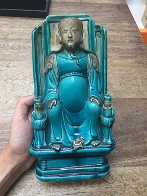 Lot 50 - A TURQUOISE GLAZED FIGURE OF AN IMMORTAL.