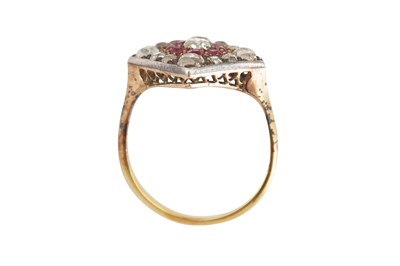 Lot 32 - A ruby and diamond cluster ring