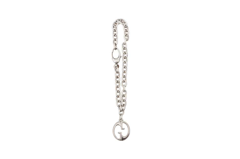 Lot 486 - Gucci Silver GG Logo Chain Bracelet