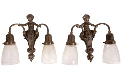 Lot 190 - A PAIR OF PATINATED BRONZE TWIN BRANCH FIGURAL WALL LIGHTS
