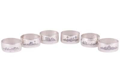 Lot 669 - SIX IRAQI SILVER AND NIELLO NAPKIN RINGS WITH RIVER SCENES