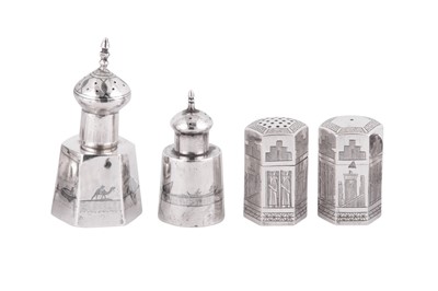 Lot 672 - A PERSIAN ENGRAVED SILVER AND AN IRAQI SILVER AND NIELLO FOUR-PIECE CRUET SET