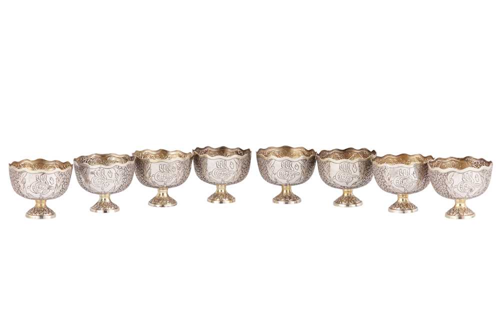 Lot 705 - EIGHT OTTOMAN PARCEL-GILT ENGRAVED ZARF HOLDERS