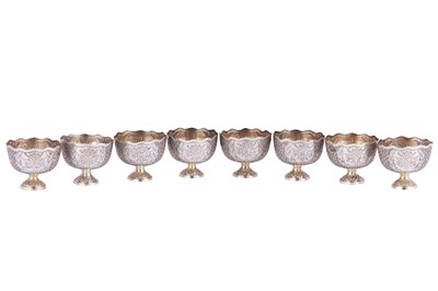 Lot 705 - EIGHT OTTOMAN PARCEL-GILT ENGRAVED ZARF HOLDERS