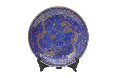Lot 161 - A CHINESE BLUE-GROUND GILT-DECORATED 'DRAGON' DISH.