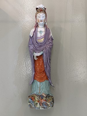 Lot 85 - A CHINESE ENAMEL-DECORATED DEHUA FIGURE OF GUANYIN