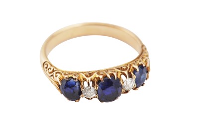 Lot 24 - A sapphire and diamond five-stone ring