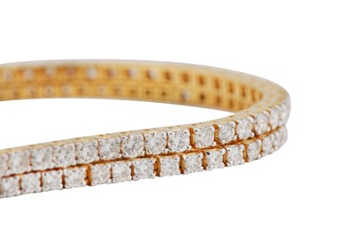 Lot 109 - A pair of diamond-set bracelets