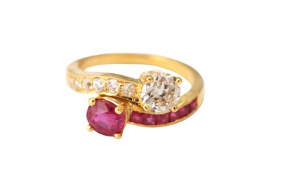 Lot 106 - A ruby and diamond toi et moi ring