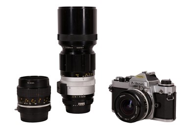 Lot 373 - A Nikon FE SLR Camera Outfit
