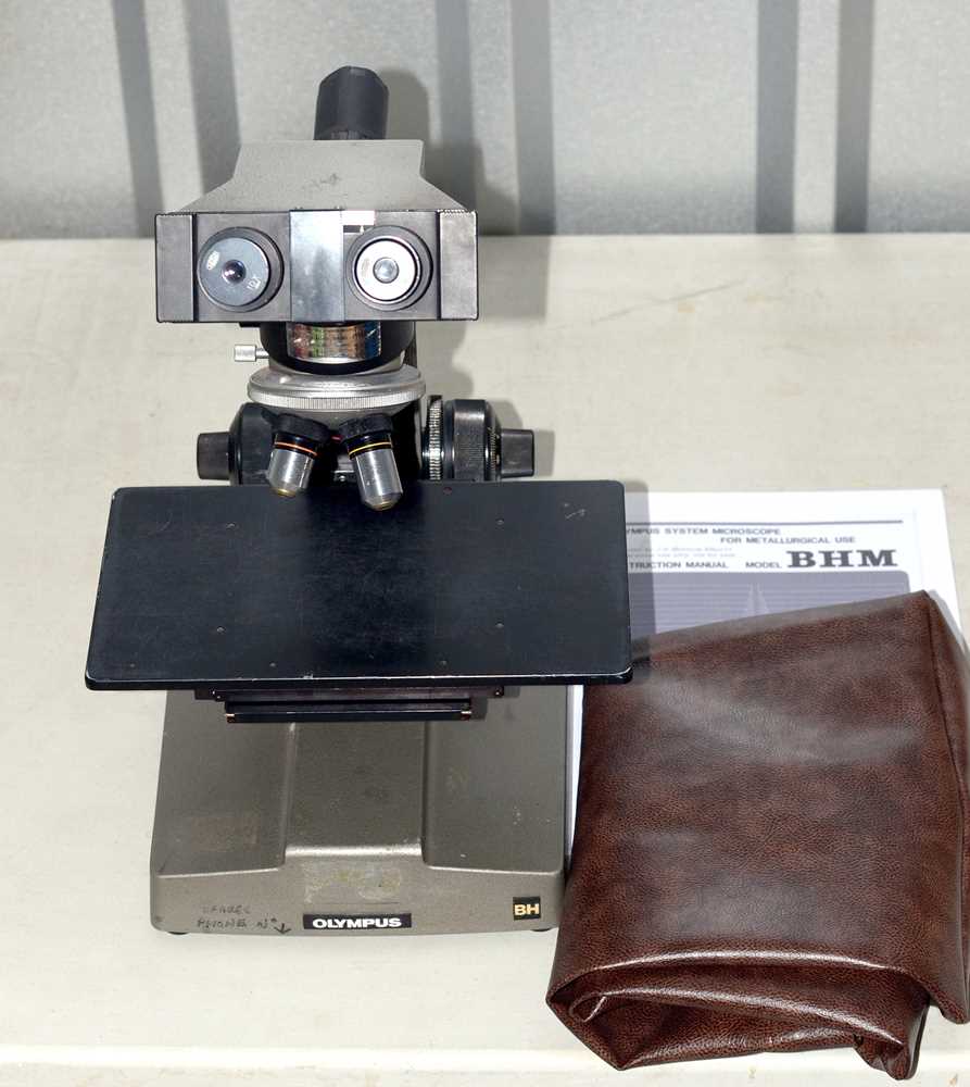 Lot 66 - Olympus BHM Binocular Microscope for