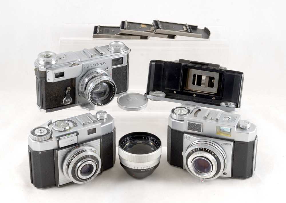 Lot 355 - A Contax II with Standard and Cut Sheet Backs & a Pair of Zeiss Contina Cameras.