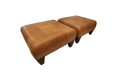 Lot 159 - A PAIR OF TUFTED TAN LEATHER OTTOMANS