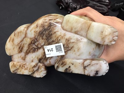 Lot 307 - A CHINESE PALE CELADON JADE 'MYTHICAL BEAST' CARVING
