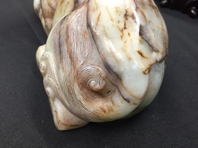 Lot 307 - A CHINESE PALE CELADON JADE 'MYTHICAL BEAST' CARVING