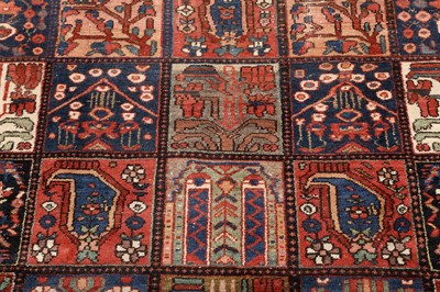 Lot 101 - AN ANTIQUE BAKHTIARI GARDEN DESIGN CARPET, WEST PERSIA