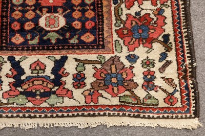 Lot 101 - AN ANTIQUE BAKHTIARI GARDEN DESIGN CARPET, WEST PERSIA