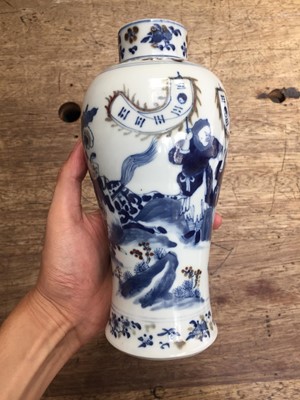 Lot 110 - A PAIR OF CHINESE BLUE AND WHITE AND UNDERGLAZE RED 'WARRIORS' VASES AND COVERS.
