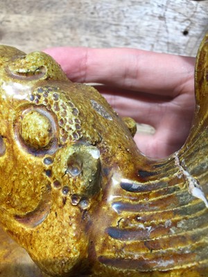 Lot 128 - A PAIR OF YELLOW-GLAZED 'FISH' ROOF TILES.