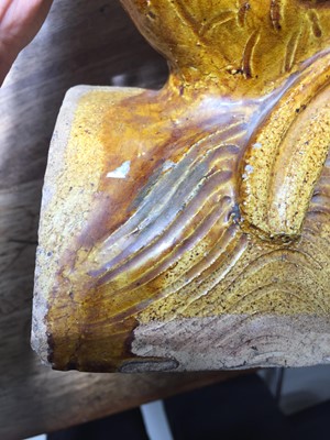 Lot 128 - A PAIR OF YELLOW-GLAZED 'FISH' ROOF TILES.
