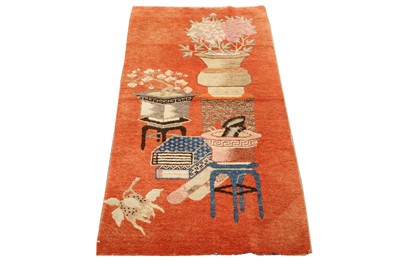 Lot 48 - AN ANTIQUE CHINESE RUG