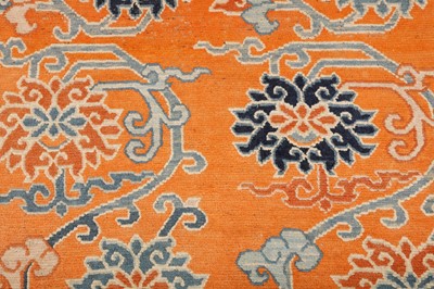 Lot 71 - AN ANTIQUE TIBETAN RUG