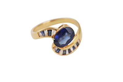 Lot 112 - A sapphire and diamond dress ring