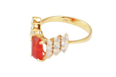 Lot 107 - A fire opal and diamond dress ring