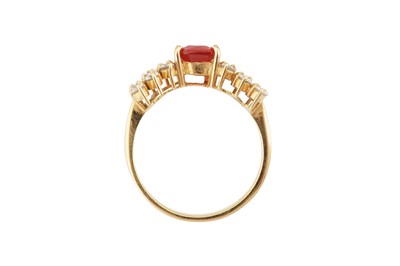 Lot 107 - A fire opal and diamond dress ring