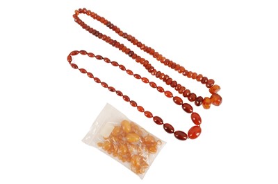 Lot 125 - A GROUP OF THREE AMBER NECKLACES