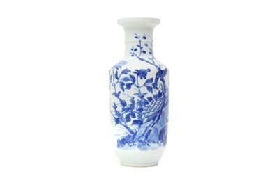 Lot 520 - A CHINESE BLUE AND WHITE 'BIRD AND PEONIES' ROULEAU VASE.