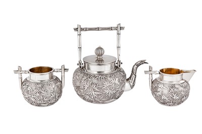 Lot 417 - An early 20th century Chinese Export silver three-piece bachelor tea set, Canton circa 1900 retailed by Wang Hing