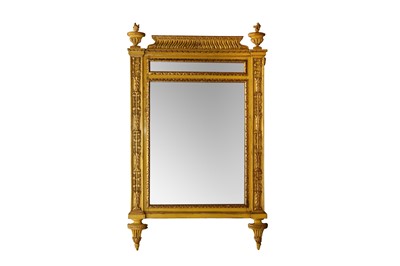 Lot 275 - A GILT HIGHLIGHTED NEOCLASSICAL STYLE CARVED WALL MIRROR